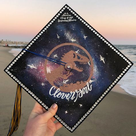 My Jurassic Park Galaxy grad cap😍 Instagram: @summerraelettering Galaxy Graduation Cap, Preschool Graduation, Graduation Picture Poses, Graduation Diy, Grad Cap, Senior Year, Graduation Pictures, Graduation Cap, Jurassic Park