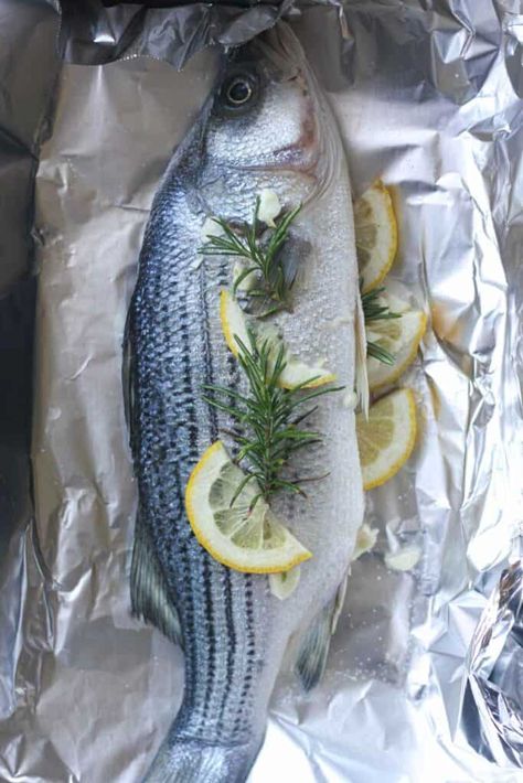 Baked whole striped bass in foil - The Top Meal Whole Striped Bass Recipe, Striped Bass Recipe Baked, Whole Sea Bass Recipes, Striped Bass Recipe, Striper Fish, Whole Fish Recipes, Cook Skins, Sea Bass Recipes, Fish Recipes Baked