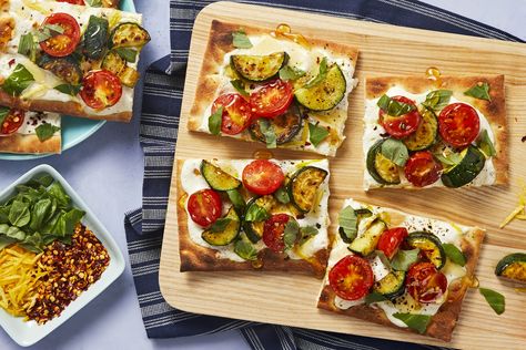 Veggie Flatbreads with Ricotta and Honey Recipe | HelloFresh Tomato Flatbread, Veggie Flatbread, Fresh Dinners, Zucchini And Tomato, Zucchini Tomato, 5 Ingredient Dinners, Fresh Recipes, Lemon Ricotta, Blue Apron