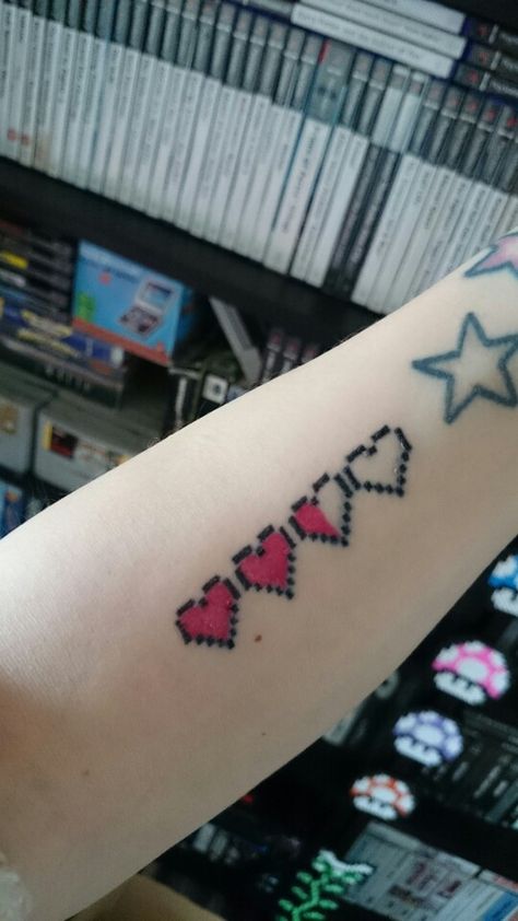 My Zelda Hearts tattoo <3 Zelda Hearts Tattoo, Zelda Heart Tattoo, Zelda Heart, Hearts Tattoo, Console Gaming, Deathly Hallows Tattoo, Heart Tattoo, Triangle Tattoo, Nintendo