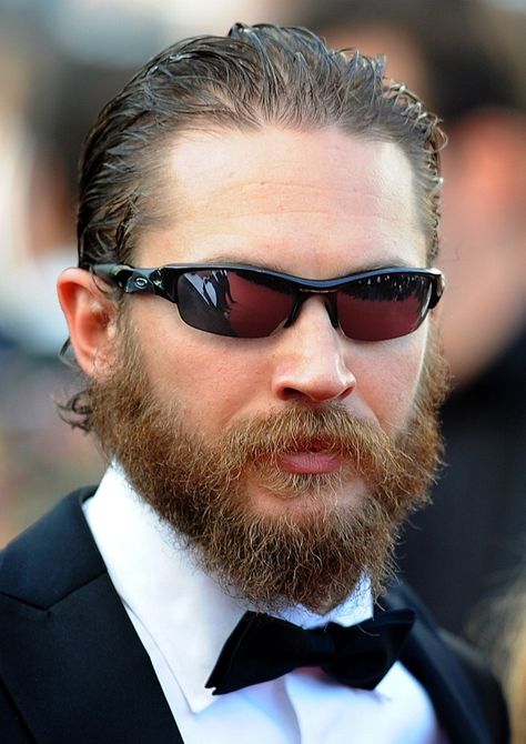 <b>Tom Hardy is one of the most beautiful male actors alive, but he's also got some of the most ridiculous photos on the internet.</b> Tom Cruise Sunglasses, Tom Hardy Pictures, Tom Hardy Photos, Flak Jacket, Oakley Glasses, نظارات شمسية, Wearing Sunglasses, Tom Hardy, Tom Cruise