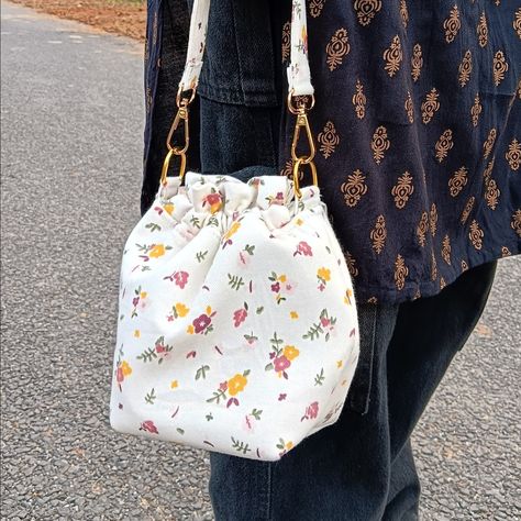 this small floral drawstring bag is like a pocket full of sunshine! 🌸☀️ perfect for your little treasures, snacks, or secret goodies! carry it everywhere and feel fancy and fun! 🎒💃 #smallfloralbag #cuteandhandy #drawstringlove #flowerpower #handmadehappiness #bagsoffun #handmadewithlove #bagtalkies #potlibag #christmasgift #handmadebag #drawstringbag #pinterestinspired #aesthetic Unique Pouch, Makeup Pouches, Pocket Full Of Sunshine, Handmade Makeup, Potli Bags, Handcrafted Bags, Floral Bags, Makeup Pouch, Beauty Essentials