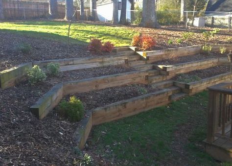 Backyard Landscaping Effect with Tiered Railroad Tie Wooden Berm Railroad Ties Landscaping, Sloped Backyard Landscaping, Terraced Landscaping, Terraced Backyard, Railroad Ties, Landscaping On A Hill, Sloped Yard, Sloped Backyard, Landscaping Retaining Walls