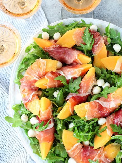 This Melon Mozzarella Prosciutto Salad with Arugula pairs classic Italian ingredients to create a sweet and savory take on the traditional caprese salad.  Perfect for a healthy al fresco lunch or a light dinner! #SaladRecipe #MelonSalad #ProsciuttoRecipe #GlutenFree #GlutenFreeSalad #TasteAndSee Mozzarella Prosciutto, Prosciutto Salad, Mediterranean Salad Recipe, Arugula Recipes, Dinner Favorites, Super Salads, Gluten Free Salads, Gluten Free Main Dishes, Potluck Party