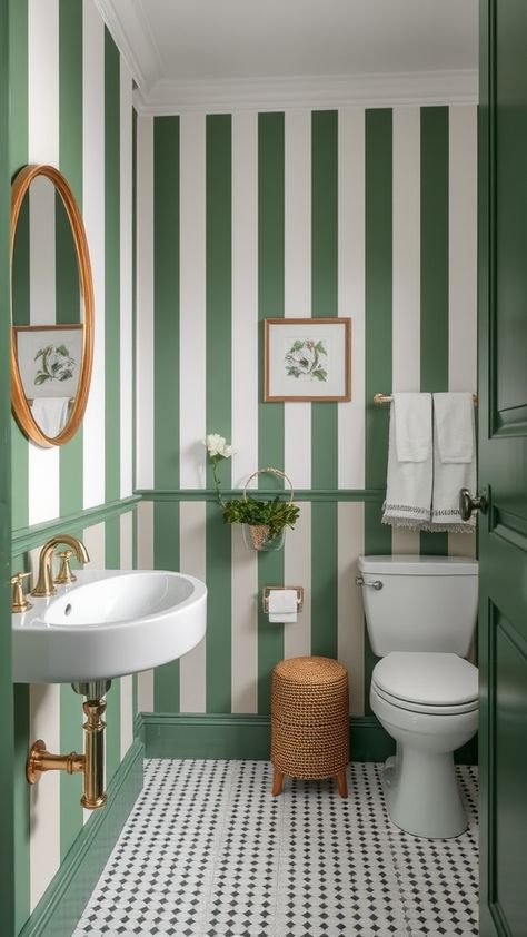 Sophisticated Stripes: Green and White Wallpaper Bathroom Decor Ideas- Transform your bathroom into a tranquil oasis with our curated list of 20+ Bathroom Decor Ideas featuring stunning green wallpapers, perfect for creating a serene and stylish space. From lush botanical patterns to subtle mint hues, these ideas will inspire you to bring nature's calming palette right into your bathroom decor. Bathroom Pattern Wall, Striped Walls Bathroom, Funky Powder Room Wallpaper, White Wallpaper Bathroom, Green And Yellow Bathroom, Green Wallpaper Bathroom, Striped Bathroom Walls, Mint Green Bathroom, Bathroom With Wallpaper