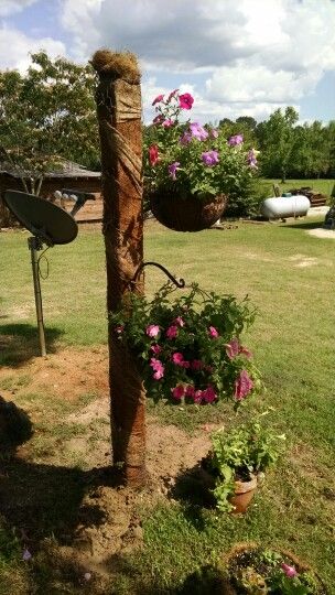 4x4 post wrapped in burlap, twine and chicken wire. Hanging baskets of same material make a nice addition to backyard Potting Ideas, Hanging Flower Baskets, Flower Baskets, Outdoor Planter, Hanging Flower, Planter Ideas, Flower Gardens, Hanging Plant, Garden Yard Ideas