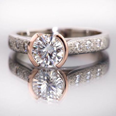 The rose gold semi-Bezel warms up this  sparkly Moissanite Star Dust Engagement Ring. Semi Bezel Engagement Ring, Half Bezel Engagement Ring, Half Bezel, Star Dust, Bezel Engagement Ring, Modern Engagement Rings, Engagement Rings Platinum, Dream Engagement Rings, Diamond Star