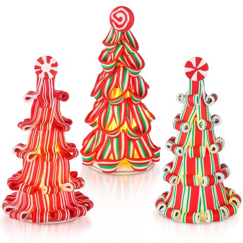 PRICES MAY VARY. Package Includes: you will get 3 pieces lighted candy canes decor (battery not included), you can combine these ornaments together, rich quantity can meet your daily decoration needs; These creative and distinct styles provide color, texture, and depth to any area in your home, full of Christmas flavors Size and Material: the candy canes decor measures about 7 inches/ 18 cm in height, proper for you to use and decorate, please check the size before ordering; The candy canes deco House Centerpieces, Clay Ribbon, Decor For Table, Candy Decor, Candy Cane Crafts, Canes Decor, Candy Tree, Red Christmas Decor, Striped Decor