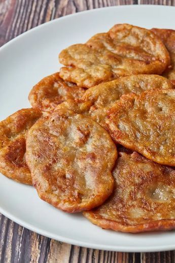 Jamaican Banana Fritters Recipe Banana Fritters Jamaican, Banana Fritters Recipe, Jamaican Banana Fritters, Jamaican Breakfast, Make Ahead Christmas Appetizers, Desserts Around The World, Jamaica Food, Banana Fritters, Chicken Marinade Recipes