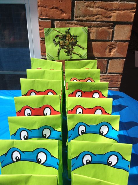 My sons ninja turtle birthday party. Favors treat bags Ninja Turtle Party Favor Ideas, Ninja Turtles Birthday Party Ideas Favors, Ninja Turtle Treat Bags, Ninja Turtle Favor Bags, Ninja Turtle Candy Bags, Tmnt Party Favors, Ninja Turtle Birthday Party, Ninja Turtle Pizza Box Favors, Turtle Birthday Party