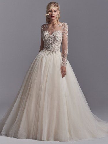 Sottero and Midgley - calvin, This sleeved wedding gown features a bodice of beaded lace motifs accented in Swarovski crystals, accenting the illusion long-sleeves, illusion sweetheart neckline, and illusion V-back. Layers of tulle create the ballgown skirt. Finished with covered buttons over zipper closure.