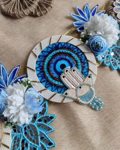 Super gorgeous Evil eye theme Bandhanwar/Toran in Blue theme with pearl and mirror work to add extra classiness to your home entrance! Because first impressions always stay!! #toran #bandhanwar #bandarwal #evileyehanging #evileyetoran #diwalicollection #diwalidecor #homedecor Evil Eye Bandarwal, Welcome Home Decorations, Home Entrance, Blue Theme, Blue Evil Eye, Diwali Decorations, Mirror Work, House Entrance, First Impressions