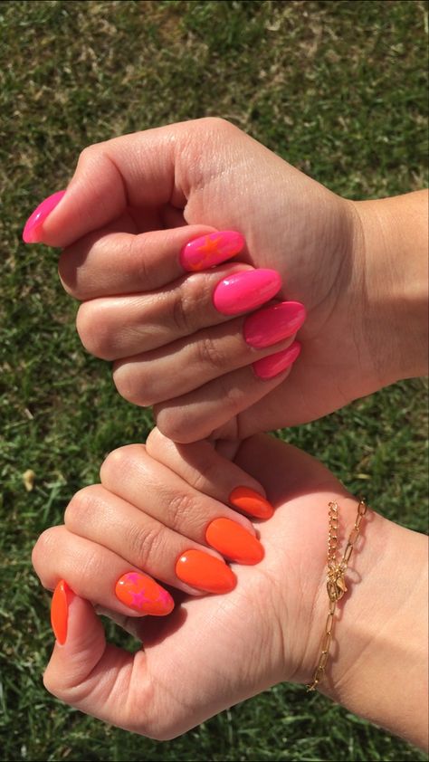 One Hand Pink And One Hand Orange Nails, One Hand Pink Other Hand Orange Nails, Two Different Colors On Each Hand Nails, Nails Two Different Hands, Pink And Orange Star Nails, Opposite Nail Colors On Each Hand, Each Hand Different Color Nails, 2 Different Color Nails On Each Hand, Pink Orange Nails Summer