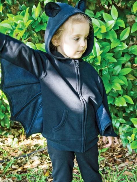 Your little one's imagination will take flight in this bat costume made from an inexpensive hoodie and felt. Pair it with black leggings or sweat pants for a comfy Halloween costume they'll want to wear long after the holiday has passed. Kids Bat Costume, Hoodie Halloween Costumes, Handmade Halloween Costumes, Bat Costume, Hoodie Costume, Halloween Templates, Diy Halloween Costumes For Kids, Makeup Party, Halloween Party Favors