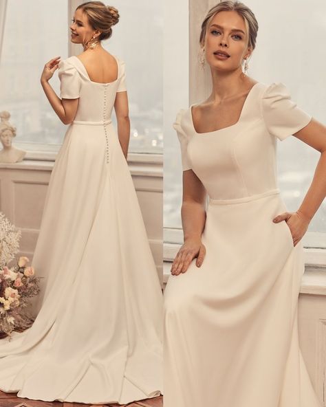 For brides looking for modest coverage, Moonlight Modesty M5051’s got your back! The crepe A-line wedding dress features chic details like its square neckline, short puff sleeves, couture waist band, and side pockets. M5051 keeps things modest and simple for wedding ceremonies held inside temples, chapels, or churches while at the same time satisfying the tastes of the modern bride. #simpleweddingdress #alineweddingdress #crepeweddingdress Vintage Short Sleeve Wedding Dress, Square Neck Bishop Sleeve Wedding Dress, Church Wedding Dresses, Simple Modest Wedding Dresses, Temple Wedding Dress, Wedding Dress Pockets, Layered Skirt Wedding Dress, Simple Church Wedding, Square Neckline Wedding Dress