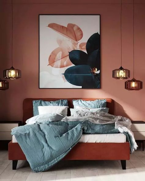 a bold and eye catchy bedroom with terracotta walls, a burnt orange bed with blue bedding, clusters of pendant lamps and a bold artwork Maximalist Living Room Decor, Terracotta Bedroom, Terracotta Walls, Dark Green Living Room, Bold Bedroom, Bedroom Orange, Bedroom Red, Blue Bedding, Blue Bedroom