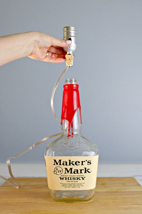 How to Make a Bourbon Bottle Lamp - Mom 4 Real Diy Bottle Lamp How To Make, How To Make A Lamp Out Of A Bottle, Bourbon Bottle Lamp, Bourbon Basement, Bourbon Bottle Crafts, Bourbon Decor, Makers Mark Bottle, Whiskey Bottle Crafts, Old Liquor Bottles