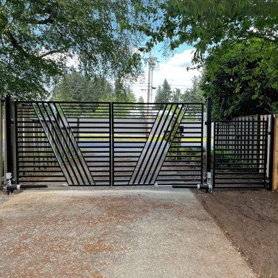 Hot-dipped galvanized steel is fully welded for superior durability and security | ALEKO Steel Dual Swing Driveway Gate - Sofia Style black | BPSP2317 | Wayfair Canada Electric Driveway Gates, Fancy Fence, Osb Plywood, Deck Gate, Security Gates, Front Fence, Driveway Gates, Solar Kit, Automatic Gate