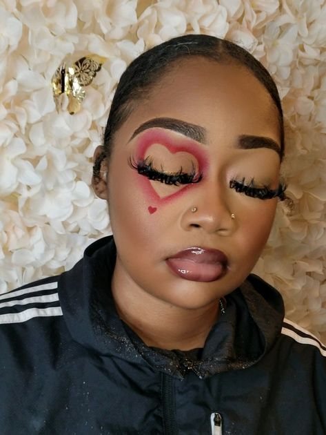 Heart Eye Makeup Aesthetic, Pink And Red Eyeliner, Cupid Face Makeup, Heart Halloween Makeup, Cupid Costume Makeup, Valentines Day Makeup Black Women, Cupid Halloween Makeup, Cupid Makeup Halloween, Cupid Makeup Looks