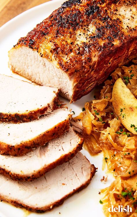 Pork & Sauerkraut Is Our Fave Winter DinnerDelish German Pork And Sauerkraut, Pork Tenderloin And Sauerkraut Oven, German Pork Tenderloin Recipes, Pork Loin And Sauerkraut In Oven, Pork Tenderloin Sauerkraut, Pork Tenderloin And Sauerkraut, Pork And Sauerkraut Oven, Pork Tenderloin With Sauerkraut, Kraut Recipes