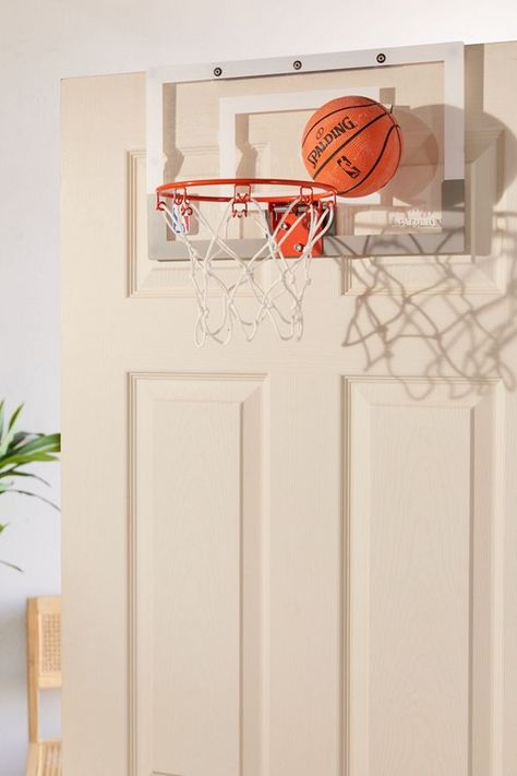 Turn your doors into storage space with these 20 clever ideas -  Over-The-Door Basketball Hoop Basketball Hoop In Bedroom, Basketball Bedroom, Basketball Room, 80s Bedroom, Bedroom Teen, Door Slam, Mini Basketball Hoop, Mini Basketball, Mini Basketballs