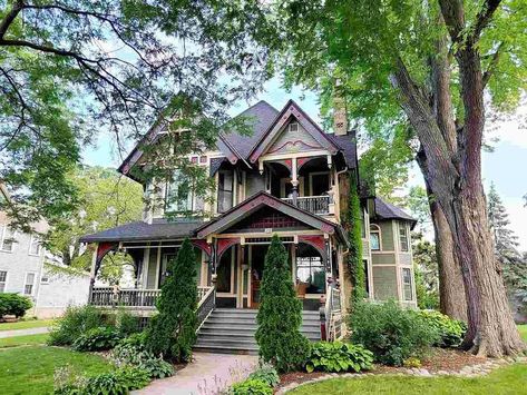 1900 Eastlake Victorian For Sale in Fond Du Lac, Wisconsin - OldHouses.com Whirlpool Tub Shower Combo, Shower Wood Floor, Coal Fireplace, Fond Du Lac Wisconsin, Tall Doors, Laundry Craft Rooms, Eastlake Victorian, Wood Wainscoting, Historic Homes For Sale