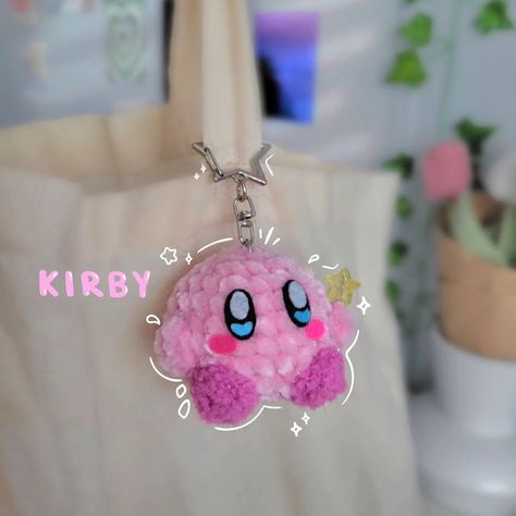 kirby keychain ☆ ₊˚˶• ༝💗 •˶ ☆‧₊˚ This kirby was soo quick to make ( minus the felt, that took me quite a bit hahah) and he was simple, but ugh I loveee how he came out!!🥹💗 I'm planning to make more for markets, he's j too cute. ☆ Pattern: @sweetbriecreations ☆ ☆ ☆ 💌 #crochet #amigurumi #kirby #crochetkirby #cutekeychains #crochetkeychains #amigurumikirby #kirbycrochet #cutekirby #aesthetic #kawaiicrochet #cutecrochet #crochetinspiration #yarn #crochetaddicts Kirby Yarn World, Crochet Kirby Keychain, Cute Mini Crochet Ideas, Kirby Crochet Pattern Free, Kirby Crochet Pattern, Plush Yarn Crochet, Kirby Amigurumi, Crochet Kirby, Kirby Keychain