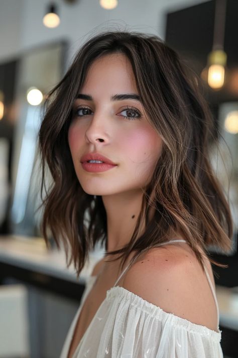 Woman with shoulder-length brown hair looking at the camera in a softly lit room. Red Hair To Brown, Cherry Highlights On Dark Hair, Brown Hair On Tan Skin, Brown Chestnut Hair, Brown Cherry Hair, Brown Cherry Hair Color, Hair On Tan Skin, Brown Hair Shoulder Length, Chocolate Brown Bob