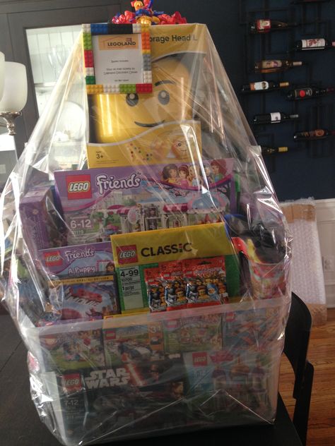 Lego raffle basket for PTA sponsored event, filled with over $400 of products! Basket For Boyfriend, Lego Gift, Silent Auction Basket, Tricky Tray, Auction Gift Basket Ideas, Fundraiser Baskets, Theme Baskets, Silent Auction Baskets, Auction Basket