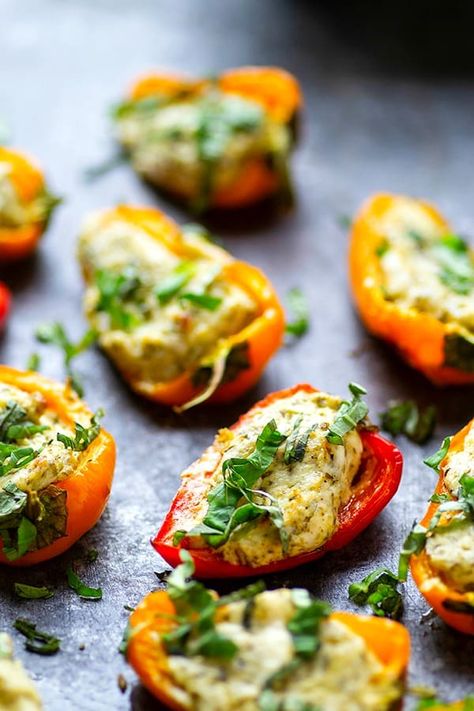 Pesto Stuffed Sweet Pepper Poppers - Stuffed with a super flavorful creamy pesto filling, these pesto stuffed sweet pepper poppers are SUPER addicting and the perfect little party app! Easy Fall Party Food, Sweet Pepper Poppers, Easy Party Snacks, Pepper Poppers, Party Mix Snacks, Fall Party Food, Bbq Chicken Sliders, Party Snacks Easy, Dessert Hummus