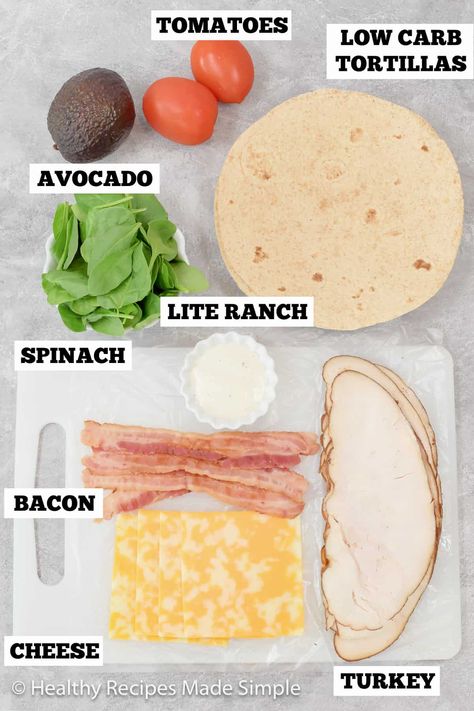 Let's get creative with lunchtime—try this totally delicious, low-carb turkey wrap! Packed with bacon, avocado and tomato, this easy-to-make meal adds flavor to your day. Don't let the taste fool you—this wrap is definitely low in carbs! Healthy Eating Sandwiches, Lunch Wrap Meal Prep, Lettuce Wrap Turkey Sandwich, Tortilla Turkey Wraps, Healthy Sandwich Wraps Lunch Ideas, Easy Turkey Wraps For Lunch, How To Make A Turkey Wrap, Low Carb Turkey Wraps, Turkey And Avocado Wrap