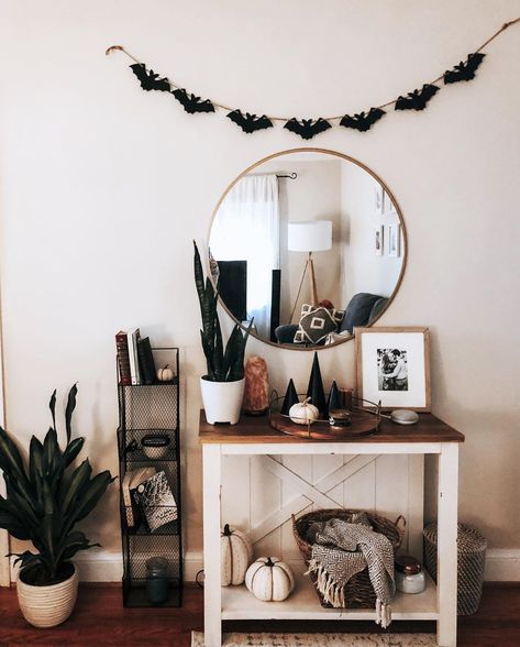 Lauren Tapley on Instagram: “I would like to describe our house as “touched lightly by witchy tones... with a hint of spook” 🦇  Believe me, I love black candles, dark…” Decorating Entryway, Candles Dark, I Love Black, Witch House, Entryway Table, Black Candles, Love Black, Believe Me, Our House