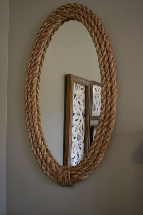 These 6 DIY Rope Decor Projects Are Stylish, Affordable, And Surprisingly Easy To Make Nautical Basement, Rope Mirror Frame, Diy Rope Mirror, Ikea Mirror Hack, Nautical Rope Mirror, Spiegel Diy, Mirror Hack, Rope Wreath, Bathroom Mirrors Diy