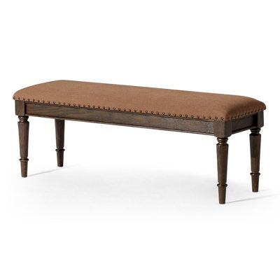 Traditional and timeless, our Elizabeth Traditional Bench is the upholstered classic every well-appointed home needs. With intricately carved wooden legs, premium upholstery with hand-applied nailhead trim, and a versatile vibe, this wooden upholstered bench would be a welcomed addition to any space in your home. Place it at the base of your bed for a polished bedroom furniture look, add it to your dining room for a stylish bench seating solution, or use it as a vanity seat or piano bench for a posh perch to add to your living room furniture collection— the placement possibilities are endless. Supreme craftsmanship combined with handmade details and solid wood construction make this bench a must-have. At Maven Lane, our home furniture is meticulously handcrafted with methods to stand the t Doorway Entrance, Traditional Benches, Vanity Seat, Sitting Bench, Piano Bench, Bench Seating, Home Needs, Wooden Bench, Wood Bench