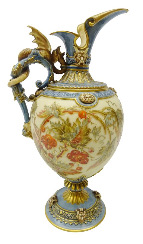 an ornately decorated vase is shown against a white background