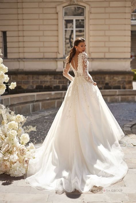 Ebba Wedding Dress | Nepovtorna Collection 2023 | Allegresse by Anna Sposa Group. Stunning wedding dress with long sleewes. Elegant A-line lace wedding dress with a train. Wedding 2023 #wedding #weddingdress #bridetobe #bride #weddinginspiration Dress With A Train, Buy Wedding Dress, Bridal Consultant, Stunning Wedding Dresses, Lace Wedding Dress, Famous Brands, A Train, Bride Dress, Fairy Tale