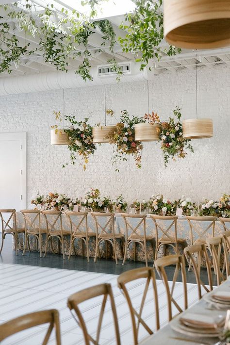 Floral Chandelier hanging floral clouds accent fall wedding reception in Raleigh, NC with roses, hydrangeas, and fall branches in colors of mauve, copper, cream, dusty pink, and green. Design by Rosemary and Finch Floral Design in Nashville, TN. Hanging Flower Clouds Wedding, Hanging Floral Arrangements Wedding, Flowers Hanging From Chandelier, Hanging Floral Wedding, Wedding Hanging Flowers, Flower Chandelier Wedding, Floral Chandelier Wedding, Fall Branches, Floral Clouds