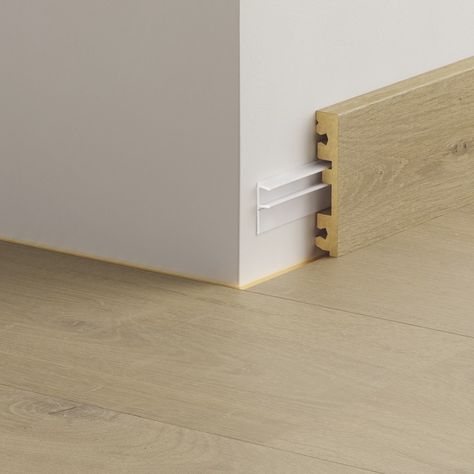 Oak Skirting Boards, which run the length of the base of the walls, are moldings that have two functions: they provide the walls visual attractiveness and shield them from scuffs and foot traffic. Oak Skirting Boards, Skirting Boards, Timeless Decor, Baseboards, Residential Building, Wood Construction, How To Plan, Wood, Wall