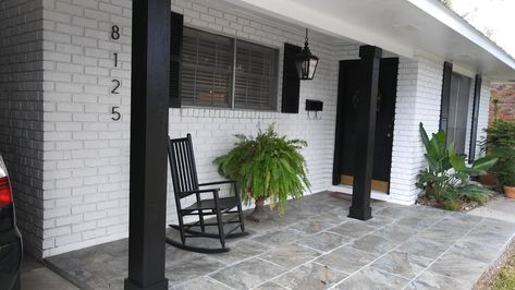 Black Stained Porch Columns, Small Front Porch Post Ideas, Replacing Wrought Iron Porch Railing, Front Porch Wood Pilars, Black Porch Columns Brick House, Covering Wrought Iron Porch Columns, Updated Porch Columns, Painted Columns On Front Porch, Black Front Porch Columns