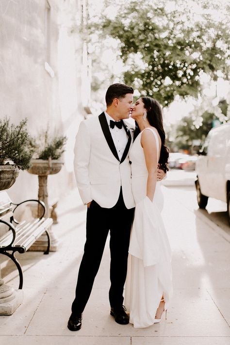 Bride and Groom wedding  day photos. Classic white tuxedo jacket for groom. All White Tuxedo Wedding Groom, White Coat Groom Wedding, White Bride And Groom Outfit, White Black Tuxedo Wedding, White Tux Black Pants Groom, White Groom Tuxedo With Bride, Groom Attire All White, White Tux Wedding Groom, Groom Attire White Suit