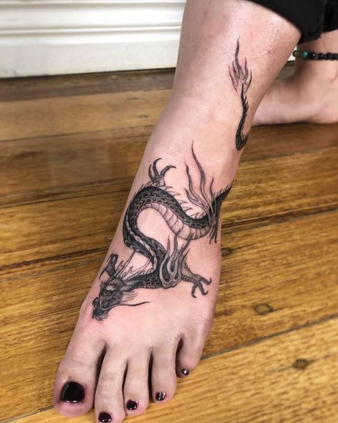 dragon tattoo on foot Dragon Tattoo On Ankle, Dragon Wrapped Around Leg Tattoo, Dragon Tattoo Ankle, Dragon Foot Tattoo, Chinese Tattoo Designs, Tattoo On Foot, Targaryen Tattoo, Physical Graffiti, Red Dragon Tattoo