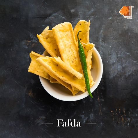 Gujaratis simply love Fafda. Deep fried besan batter in long strips and spiced with ajwain, this snack is enjoyed with a sweet chutney, raw papaya pickle and fried green chillies.  Comment “Yum!” if you are a fan of Fafda! #GujaratiCuisine #Fafda #Cuisine Fafda Recipe, Gujarati Cuisine, Fried Green, Fairs And Festivals, Gujarati Recipes, Deep Fried, Chutney, Papaya, A Fan