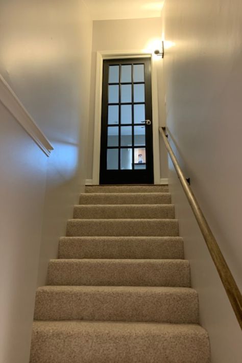 A French door creates openness and an inviting feeling to your finished basement. Stair Door Ideas, Basement Door Ideas, Door Ideas Interior, Stair Door, Basement Stair, Rachel House, Basement Door, Top Of Stairs, Moody Living Room