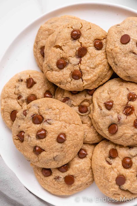 These are the ultimate whole wheat chocolate chip cookies! They're moist and chewy in the center, with crispy edges, and incredible flavor. They're easy to make from scratch with simple ingredients, and they're ready in just 55 minutes! #theendlessmeal #cookies #wholewheatcookies #wholewheat #wholewheatflour #chocolatechipcookies #cookierecipe #healthycookies Whole Wheat Chocolate Chip Cookies, Wheat Chocolate Chip Cookies, Whole Wheat Cookies, Chocolate Chip Cookies Ingredients, Make From Scratch, Frozen Cookie Dough, Perfect Chocolate Chip Cookies, Classic Cookies, Healthy Cookies