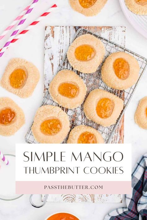 Looking for the very best thumbprint cookies? These easy mango thumbprint cookies are the best! I love a good mango cookies recipe and this one has been tested to perfection. Chances are you have most of the ingredients already and can whip these thumbprint cookies up in a flash. When my cookie cravings hit, these mango cookies really hit the spot! Mango Cookies Recipe, Mango Cookies, Best Thumbprint Cookies, Thumbprint Cookies, I Love A, Cookies Recipe, The Spot, Bite Size, Super Simple