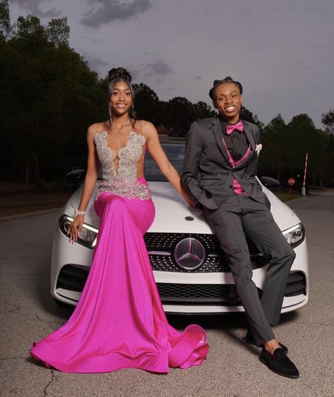 Pink And Silver Prom Couple, Prom Pictures At Night, Pink Prom Dresses With Date, Black And Pink Prom Couple, Prom Poses With Car, Prom Couples Pink, Prom Couples Black People, Black Prom Dress Couple, Pink Prom Couple