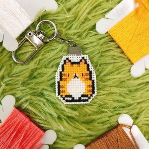 This cross stitch pattern features a double-sided design, perfect for creating keychains.
and magnets, pin badges, and other accessories.
This pattern is beginner-friendly and can be completed quickly and easily.
You can also find other cat patterns in the shop. Cheese Cat, Gray Tabby Cat, Kawaii Cross Stitch, Gray Tabby, Cat Patterns, Unique Cross Stitch, Cat Cross Stitch Pattern, Small Cross Stitch, Mini Cross Stitch