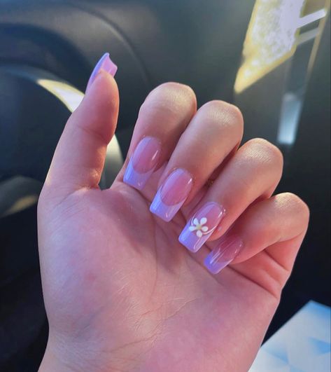 nails 2023, nail inspo 2023, nail ideas 2023, nails inspiration, trendy nails, nail art, trendy nail art, nails acrylic, nails acrylic coffin, nails 2023 trends spring, summer nails 2023, nail art designs, nail art inspo, nail art simple, nail designs trending now, French nails, white flower nails, purple nails, french purple nails, simple flower nails, purple flower nail designs Spring Nail Inspo Almond Shape, Purple Acrylics With Flowers, Purple Nails Acrylic Flower, Purple French Tip Nails Acrylic With Flowers, Purple Nails With White Flowers, Nails Acrylic Purple Lavender French Tip, Purple French Tips With Flowers, Lavender And White Nails, French Tip With Purple Flower