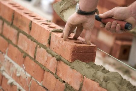 Although building a brick shed instead of wooden one may more difficult, it's still within a DIYer's reach! Building A Brick Wall, Brick Shed, Types Of Bricks, Masonry Work, Garage Door Installation, Shed Plan, Construction Work, Building A Shed, Concrete Blocks