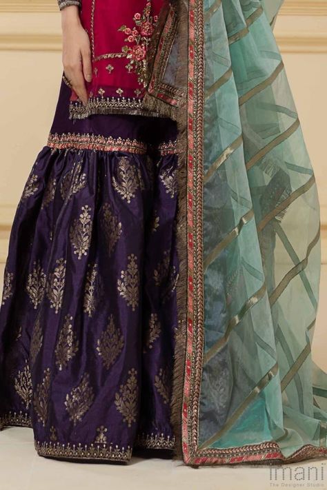 3 Pieces Outfit (Shirt, gharara and Dupatta) Organza Straight shirt intricately embroidered and hand embellished. Paired with Beautiful Purple jamawar Gharara with embroidered patti at knee and Hemline and contrast Light Turquoise colourTie&dye Organza Dupatta with embroidered patti & Fringe on all 4 sides.